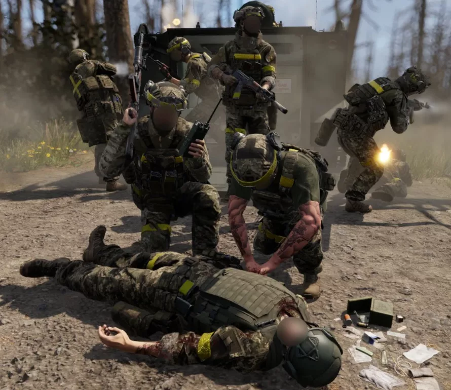 Medic treating a casualty under fire